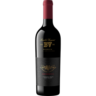 Wine bottle with red cap on a white background