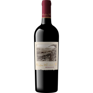 Red wine bottle with a label on a white background