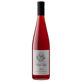 A bottle of Stags' Leap Amparo Rosé wine with a black cap and a white label, shown on a solid white background.